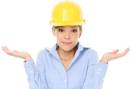 Engineer, entrepreneur or architect woman shrugging