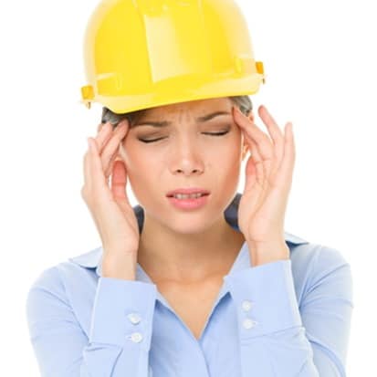 Engineer or architect woman worker headache stress