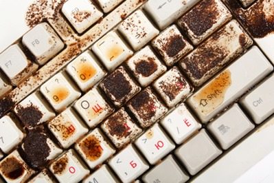 coffee spilling on keyboard 