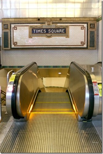 New York City Station subway Times Square sign on tile wall.