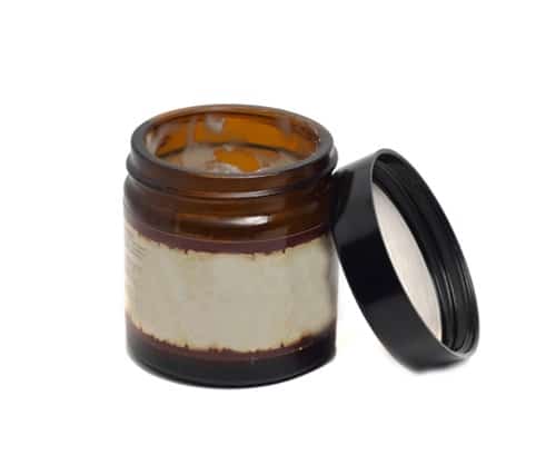 glass jar with a cover for ointments